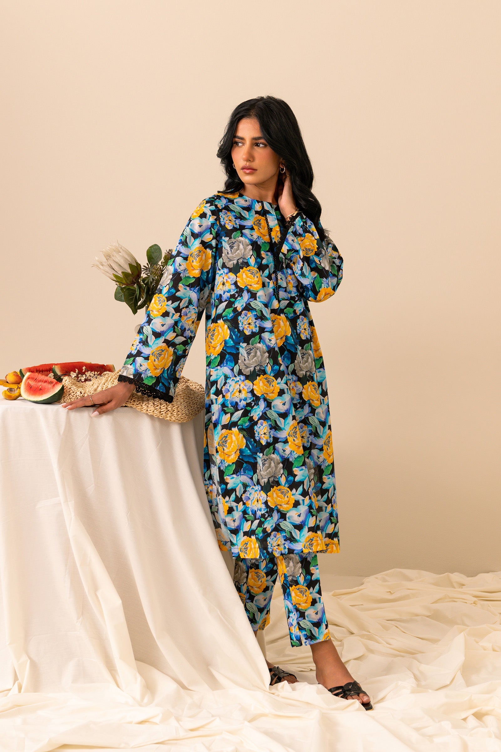 Buy ladies cambric 2-piece suit online, featuring navy base with yellow floral accents for standout style
