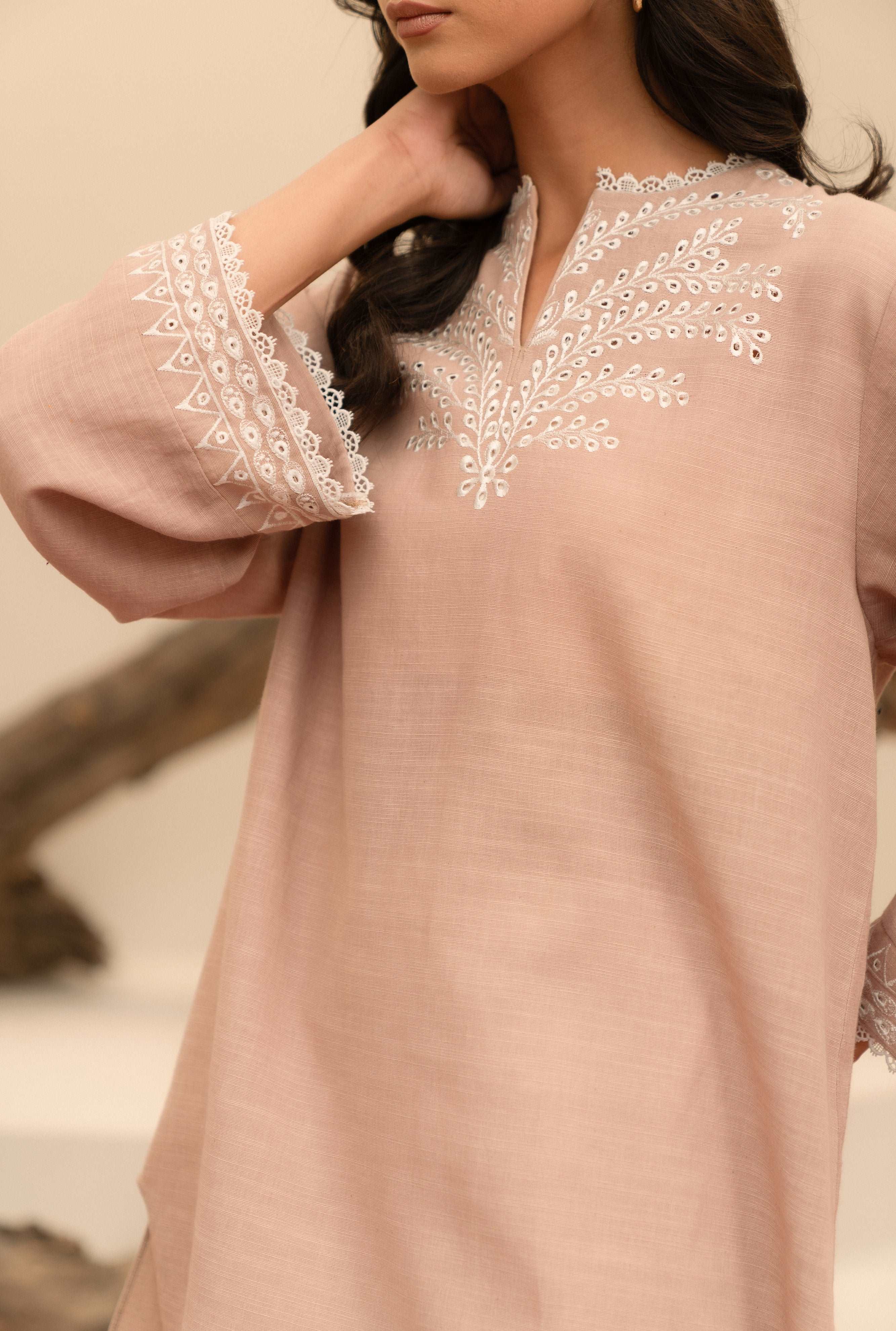 Buy ladies khaddar top with intricate embroidery, ideal for stylish and versatile outfits