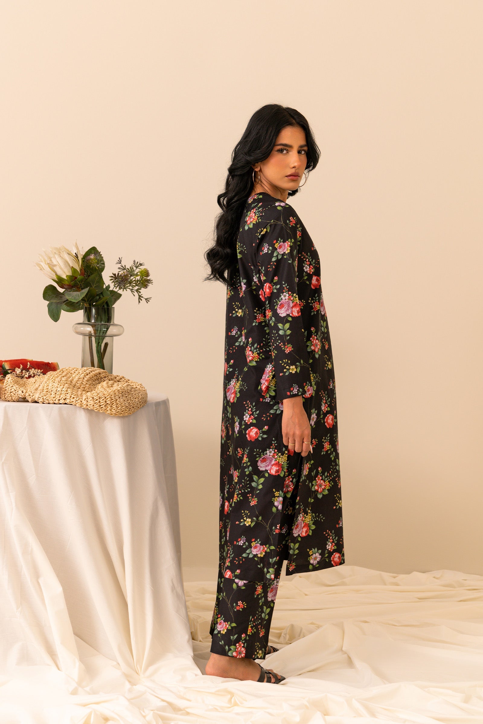 Buy online chic and classy black cambric two-piece suit, featuring colorful digital prints