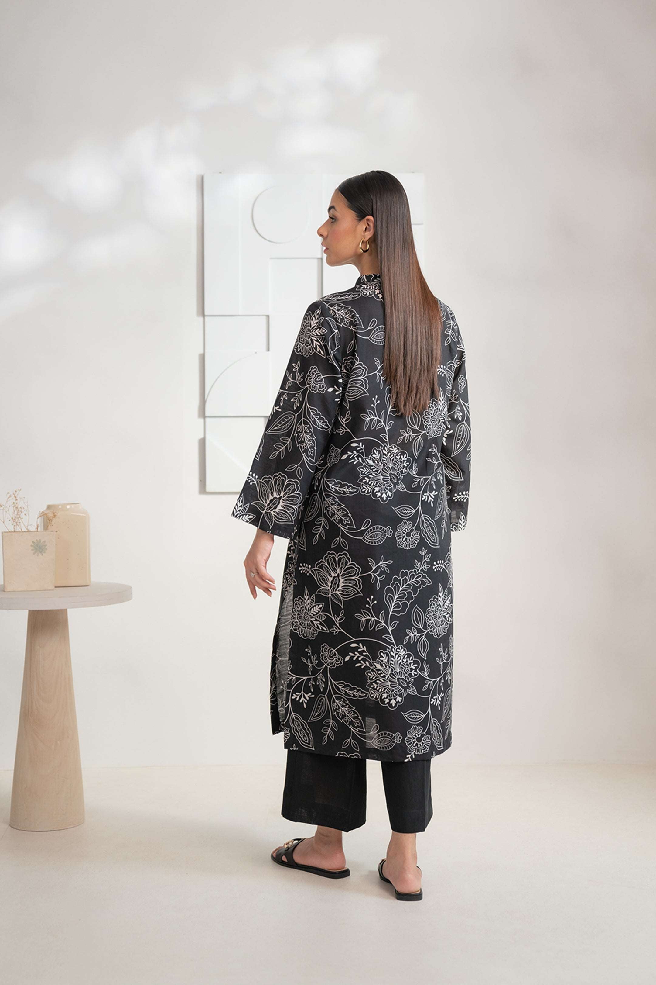 Buy this enchanting black and white Karandi shirt for ladies online, perfect for modern styling