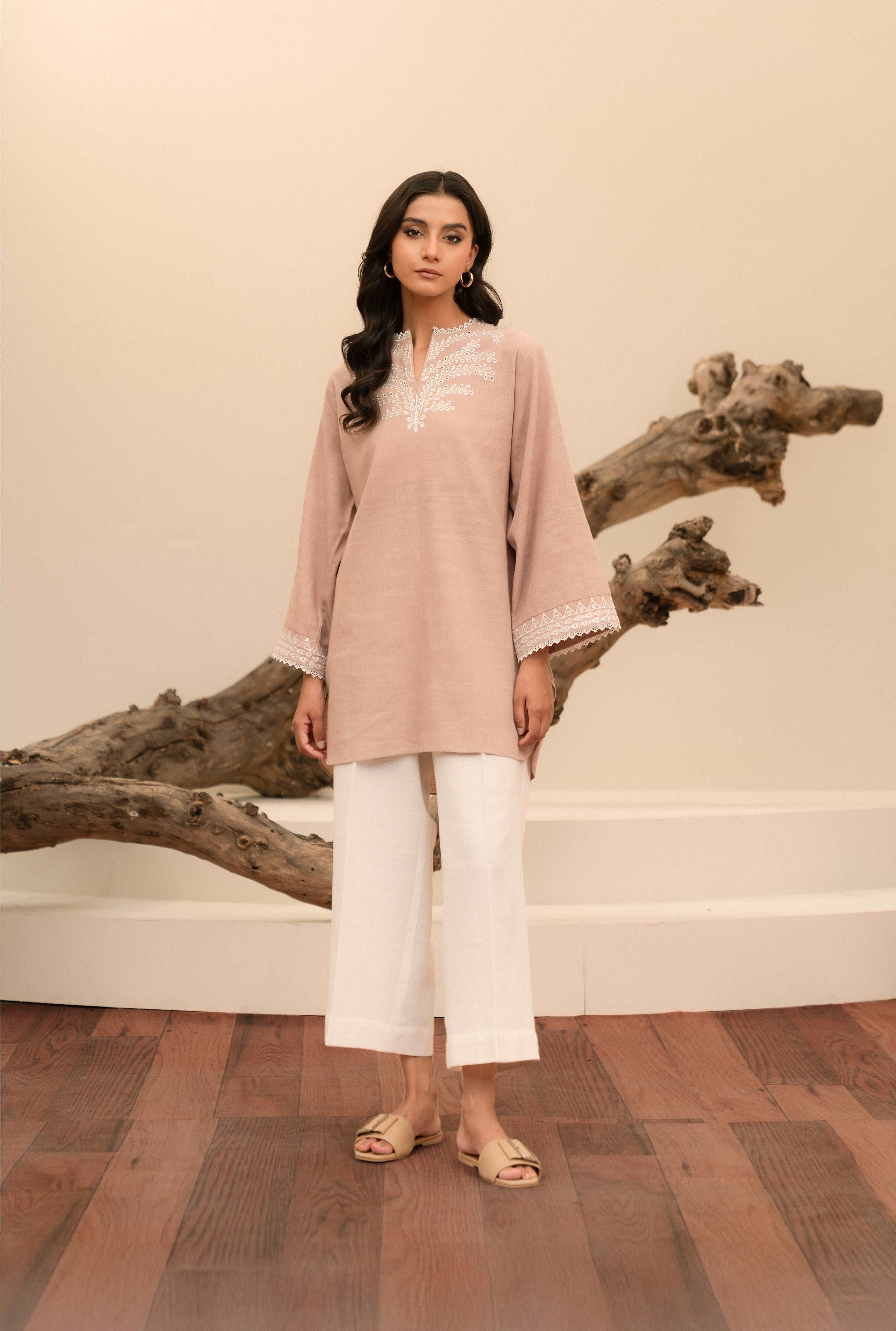 Buy versatile khaddar top for women, featuring elegant embroidery for a timeless look