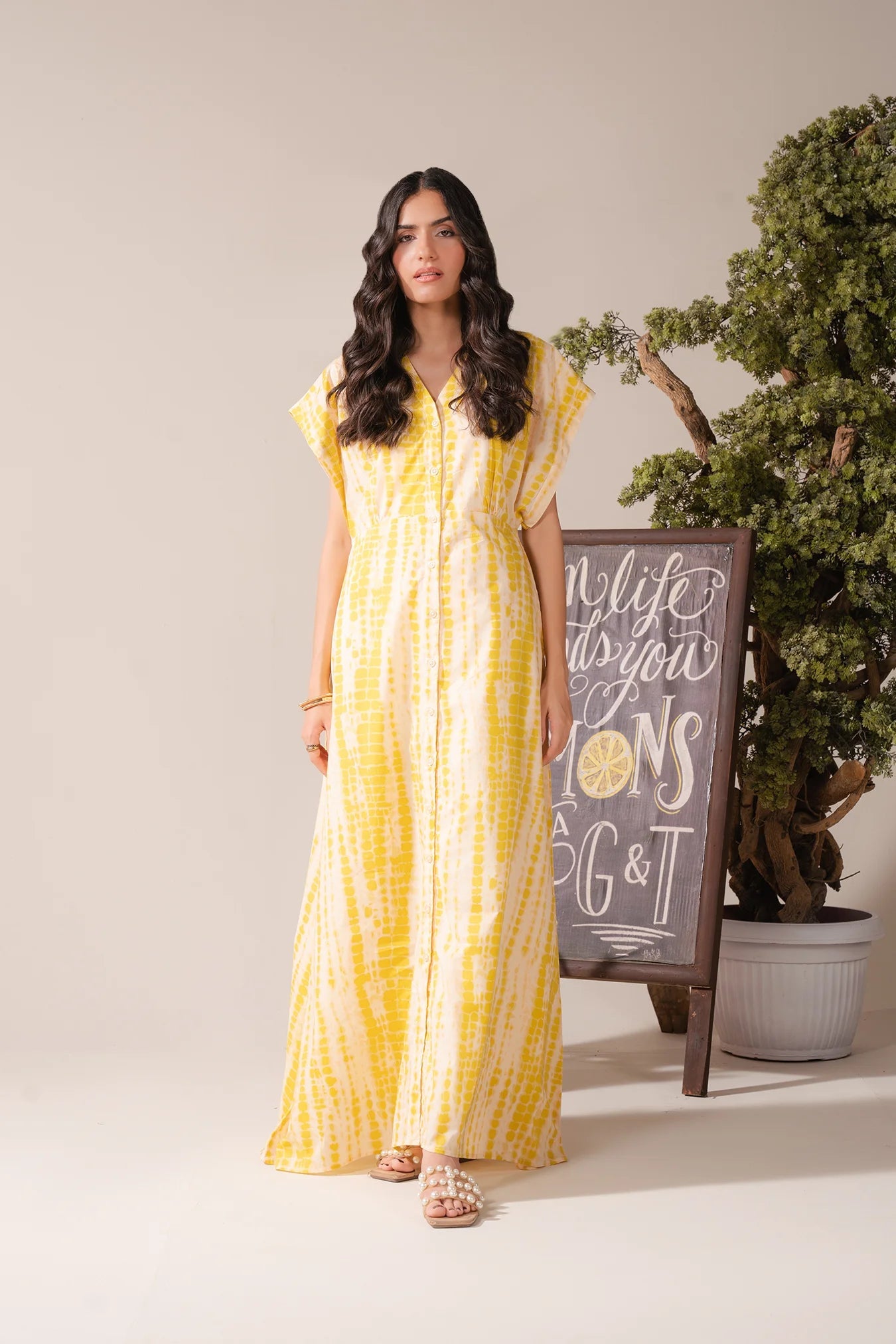 Casual yellow printed lawn maxi dress for girls – perfect Pakistani summer wear