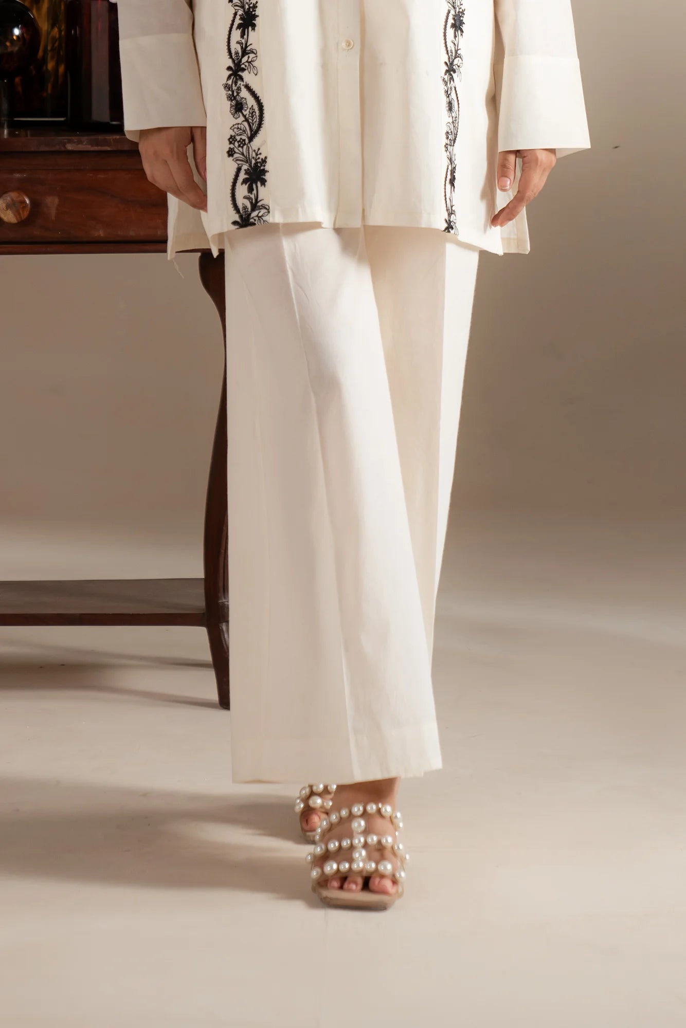 Chic white trouser for women, designed for upscale neighborhoods in Lahore, Islamabad, and Karachi for a modern, sophisticated style