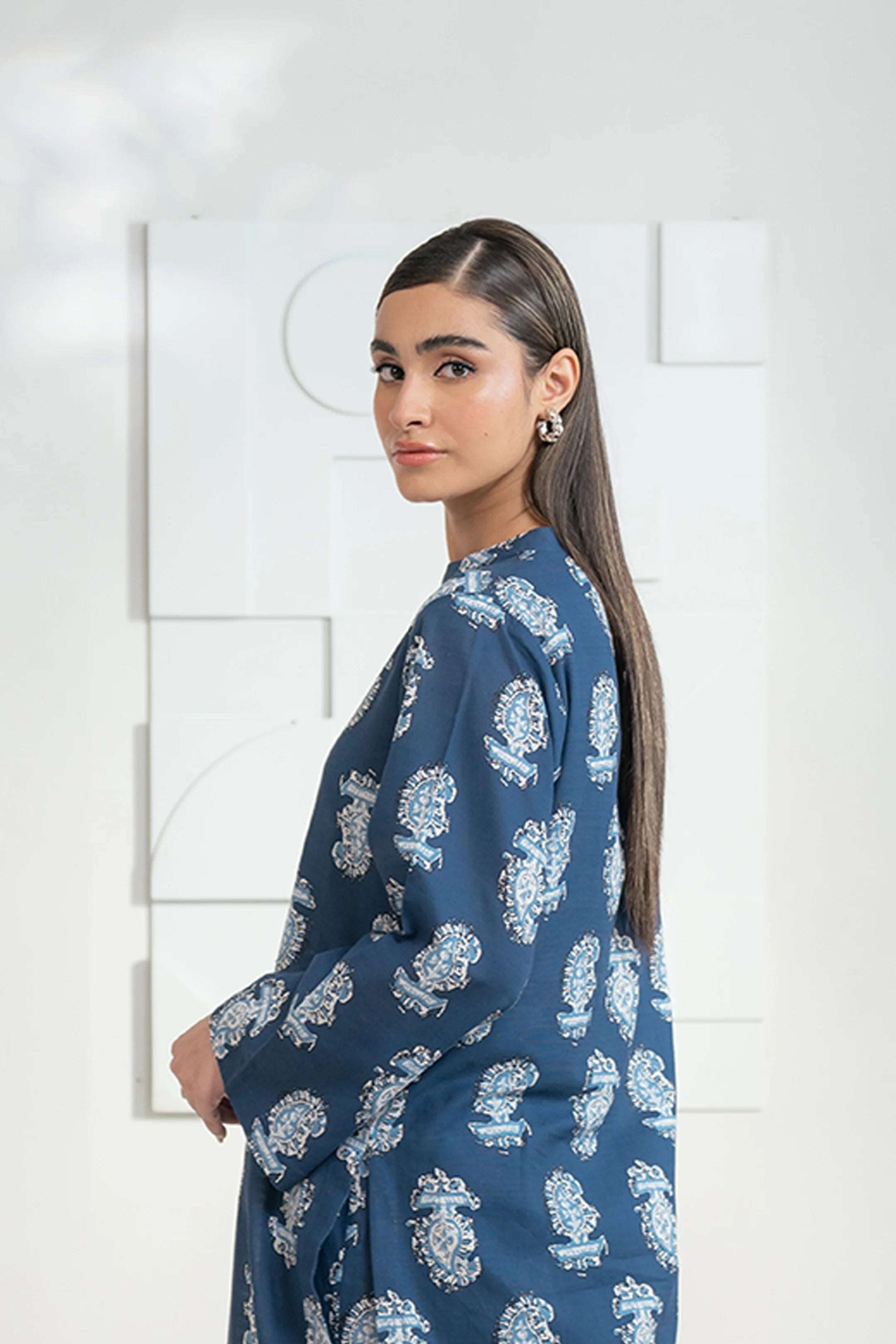 Classic and chic 2-piece khaddar suit with modern printed designs, buy online at BeyondEast.com