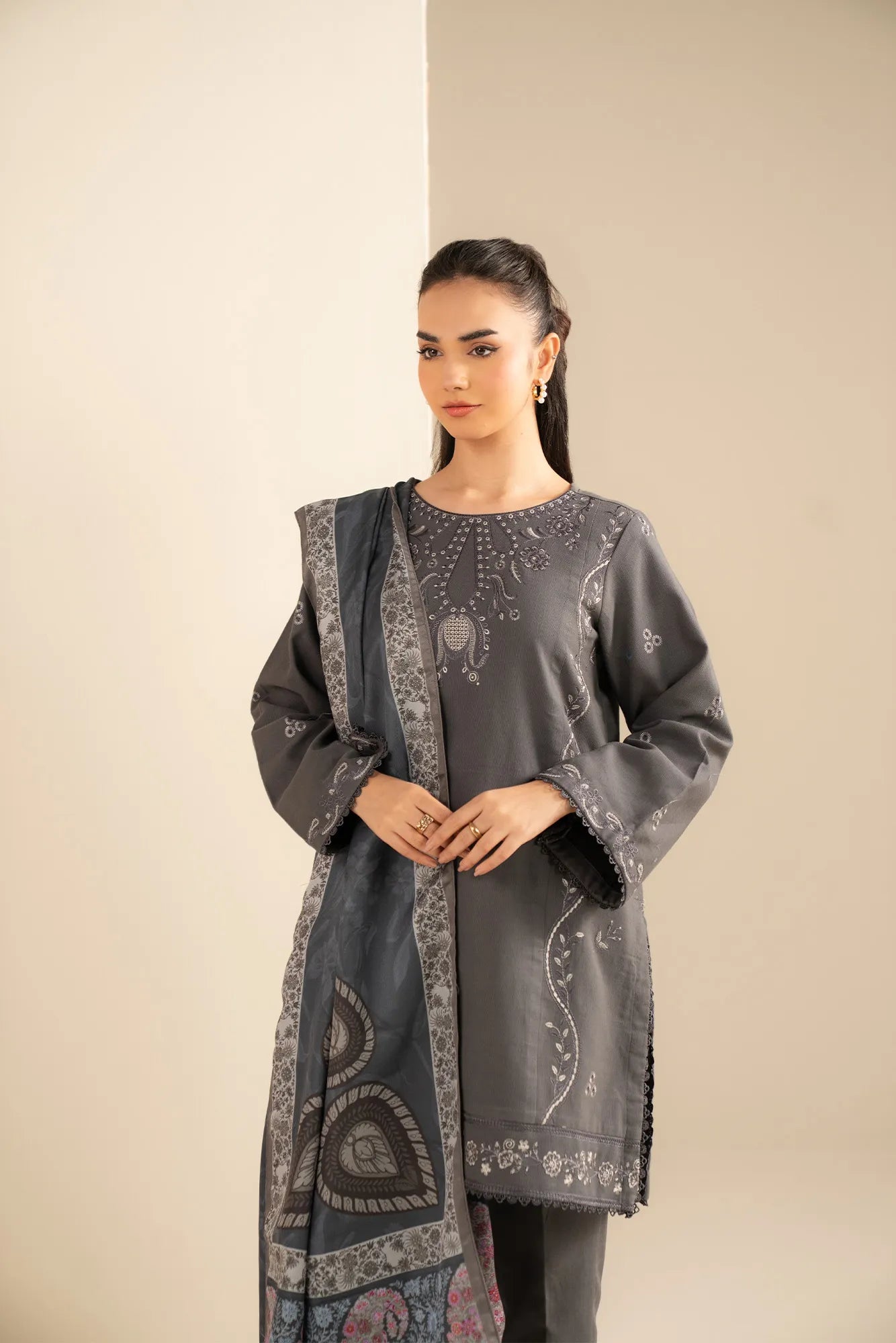 Close-up embroidery on khaddar fabric for unstitched three-piece winter suit