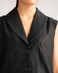 Close-up of black sleeveless cropped vest on women’s 2 piece co-ord set

