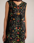 Close-up of floral print detail on black lawn shirt