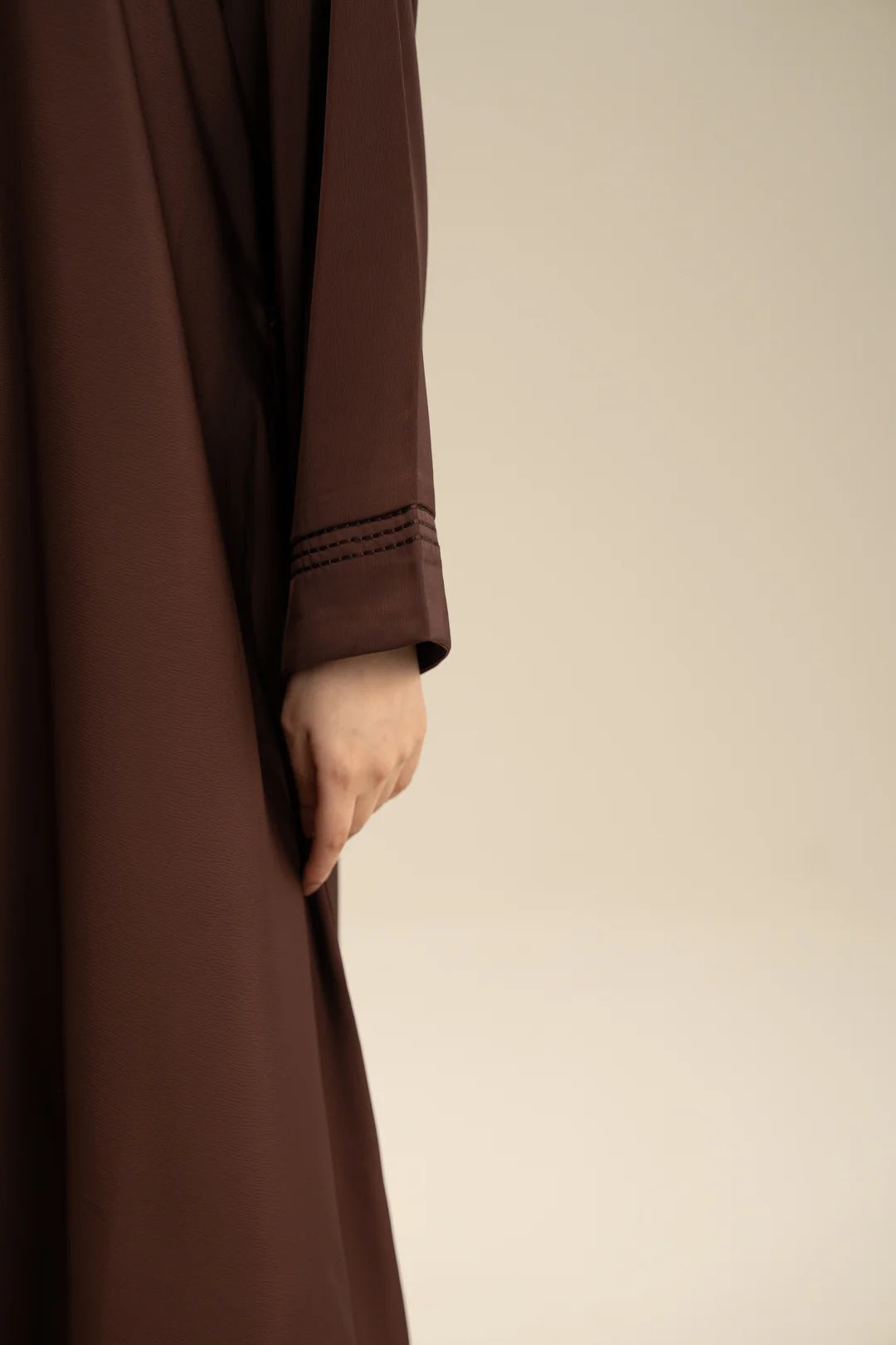 Close-up of sleeve embroidery on chocolate brown abaya – WTSE161197 Beyond East