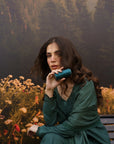 teal embroidered linen suit with high neckline and matching dupatta