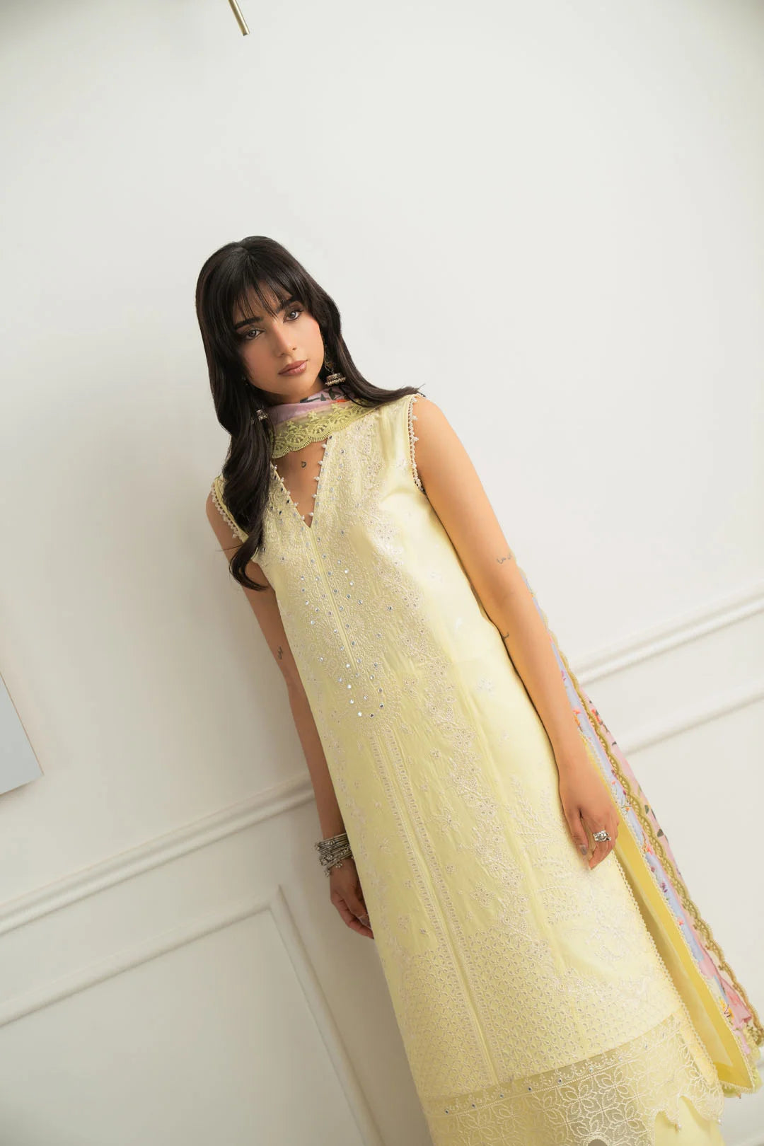Ladies butter yellow unstitched 3 piece lawn suit back view solid pastel summer Pakistan Meher 2026