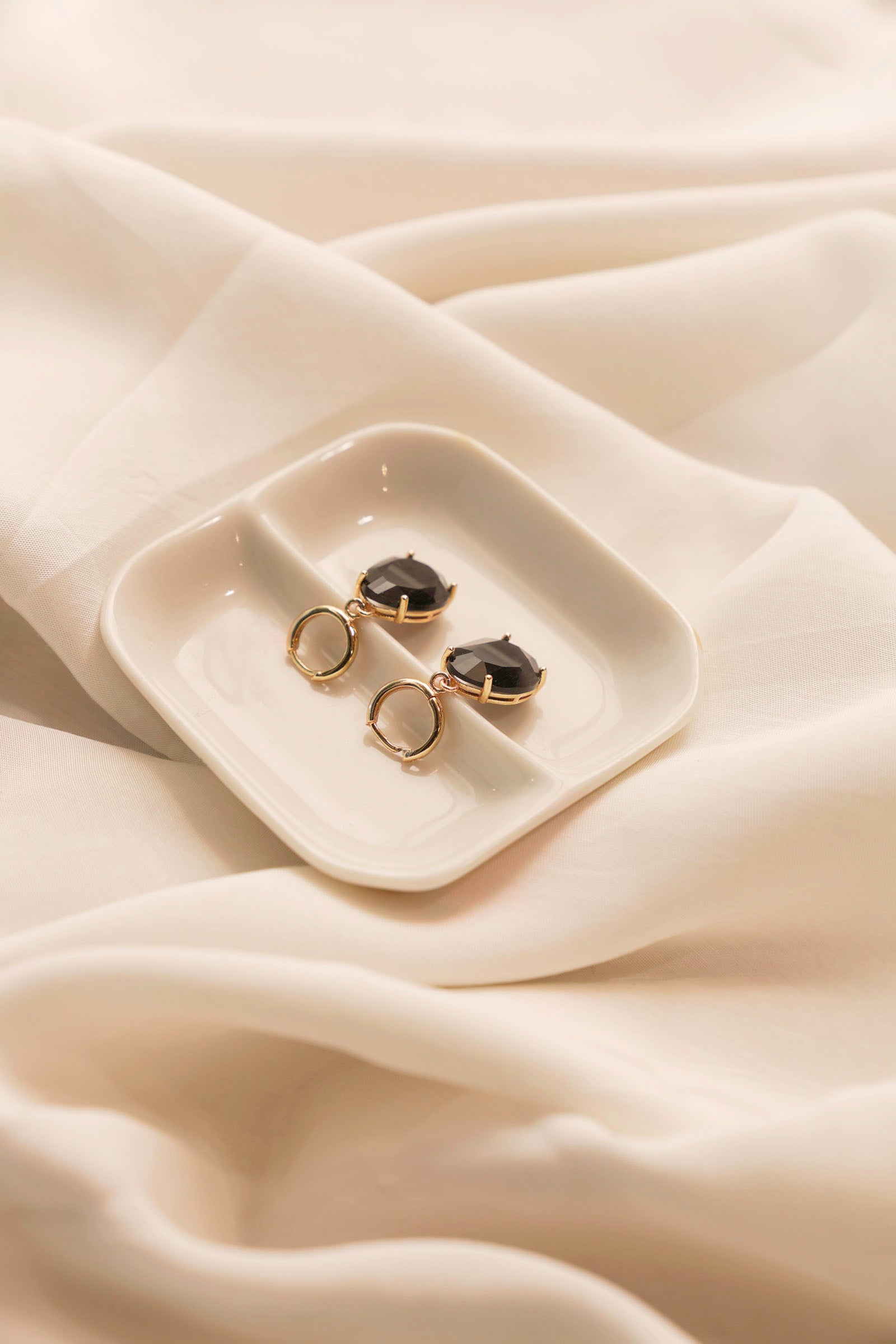 Black Earrings Beyond East Official