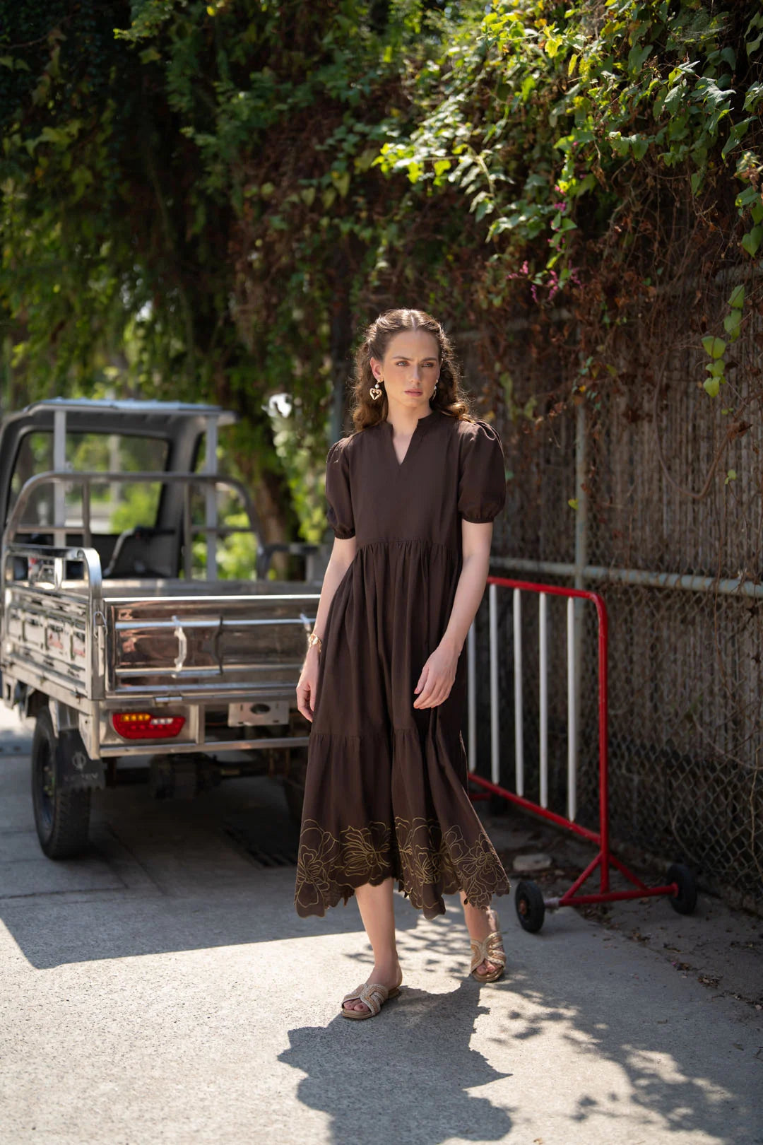 Dark brown embroidered cambric long frock for women front view