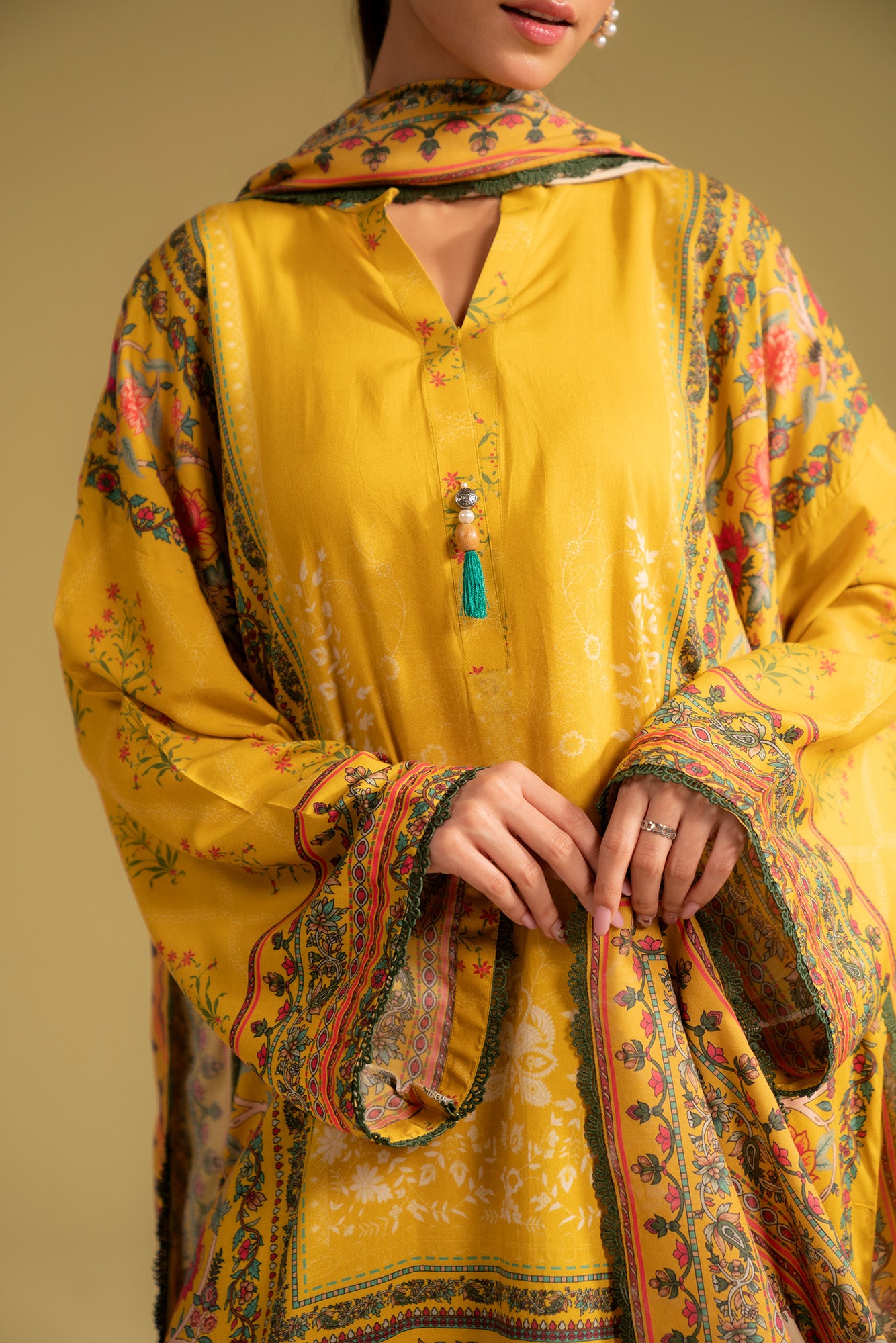 Designer-style unstitched linen suit with a floral and geometric pattern, comfortable and breathable outfit for daily wear in Islamabad