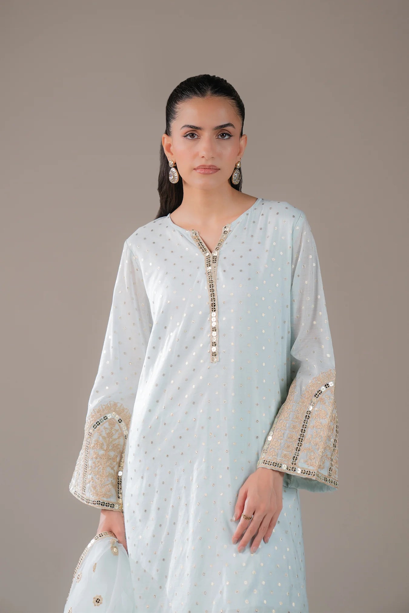 Designer festive 3 piece jamawar suit in sky blue – soft and flowy Pakistani outfit with rich embroidery and elegant finishing.