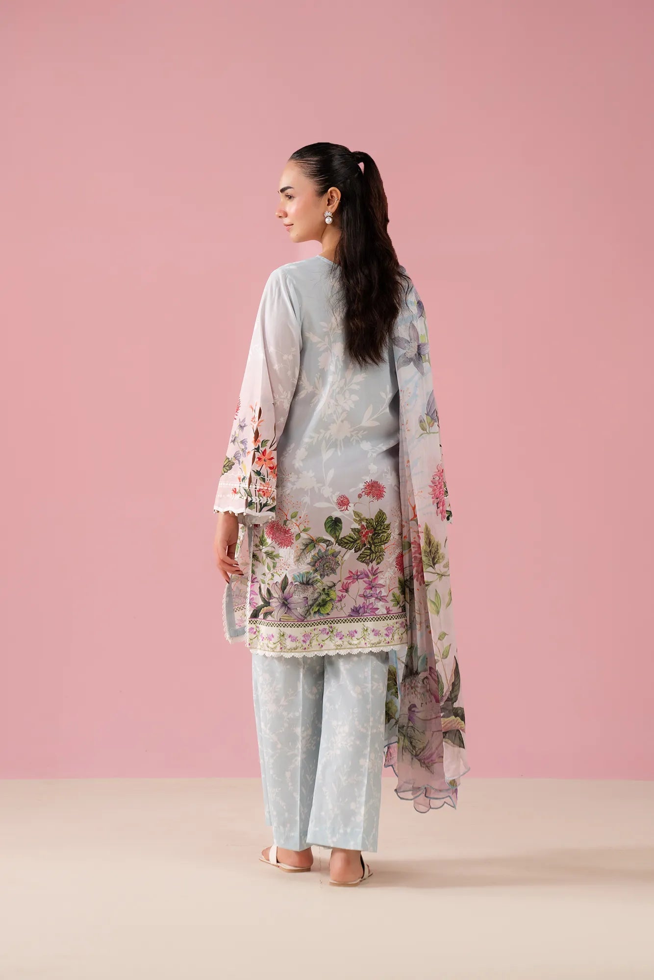 Designer sky pink 3-piece lawn suit with digital prints and embroidered organza border, tailored for women in Sargodha's elite neighborhoods like Aziz Bhatti Town Pakistan