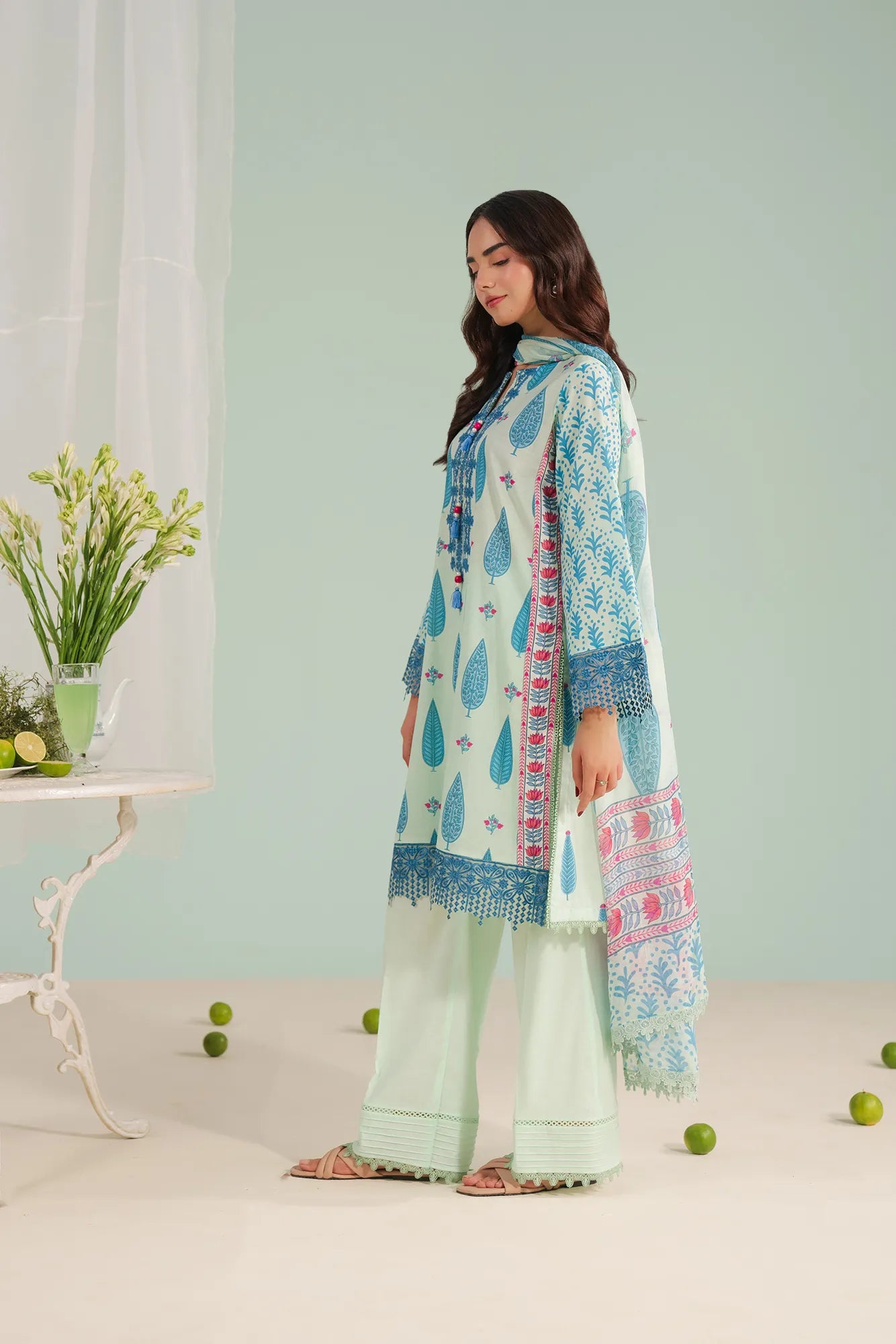 Digital printed lawn suit with embroidered organza neckline and cambric trouser, perfect for summer wear in University Town Peshawar