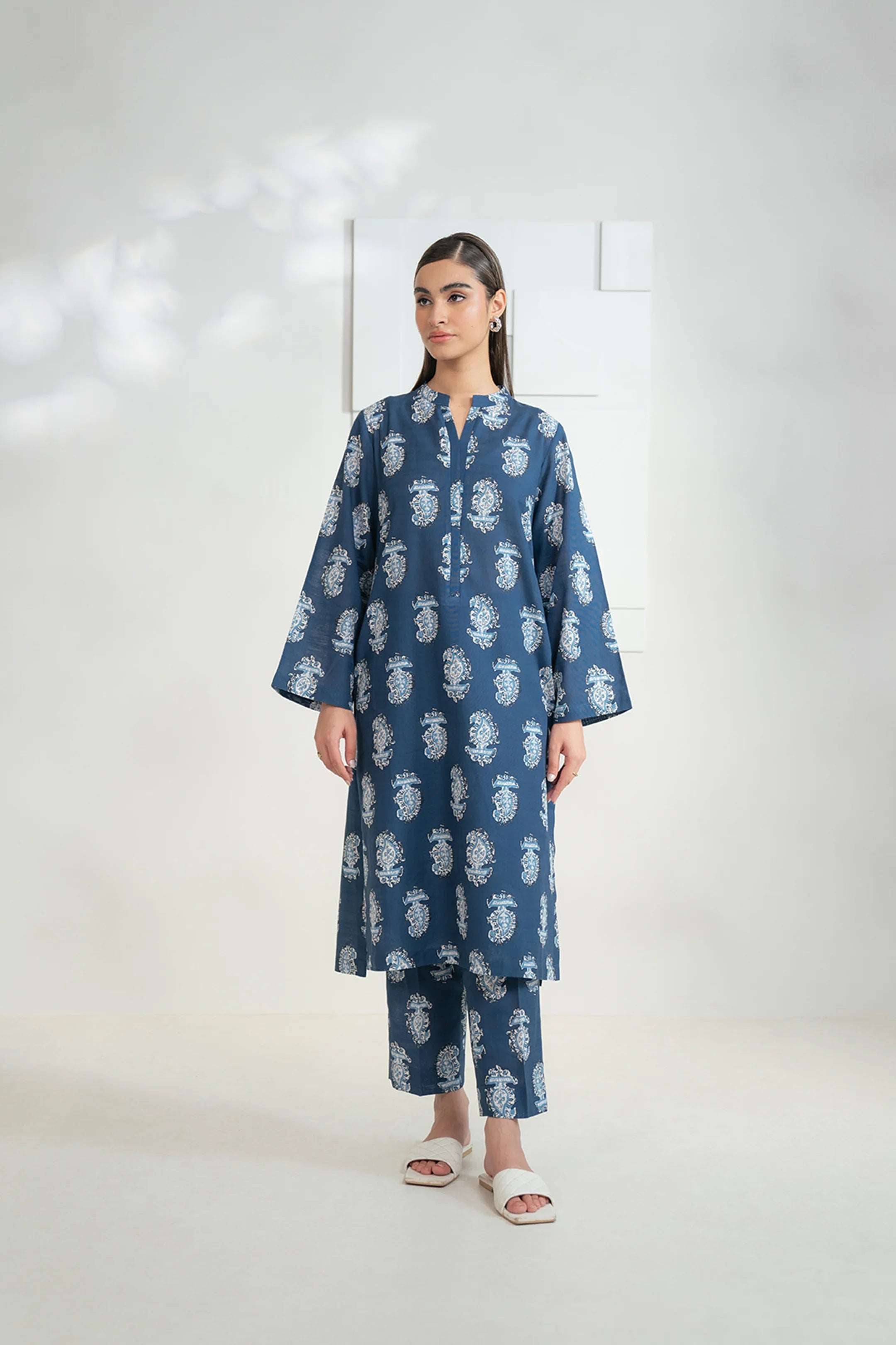Elegant 2-piece printed khaddar suit for women by Beyond East, perfect for winter wear.