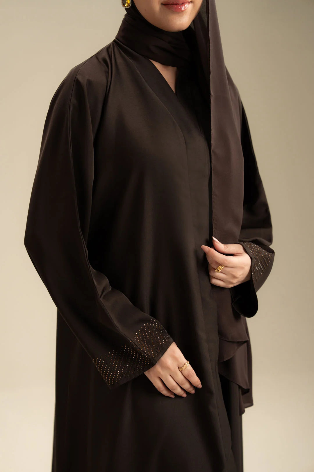 Elegant embellishment detail on sleeve of dark brown abaya – Beyond East WTB161103