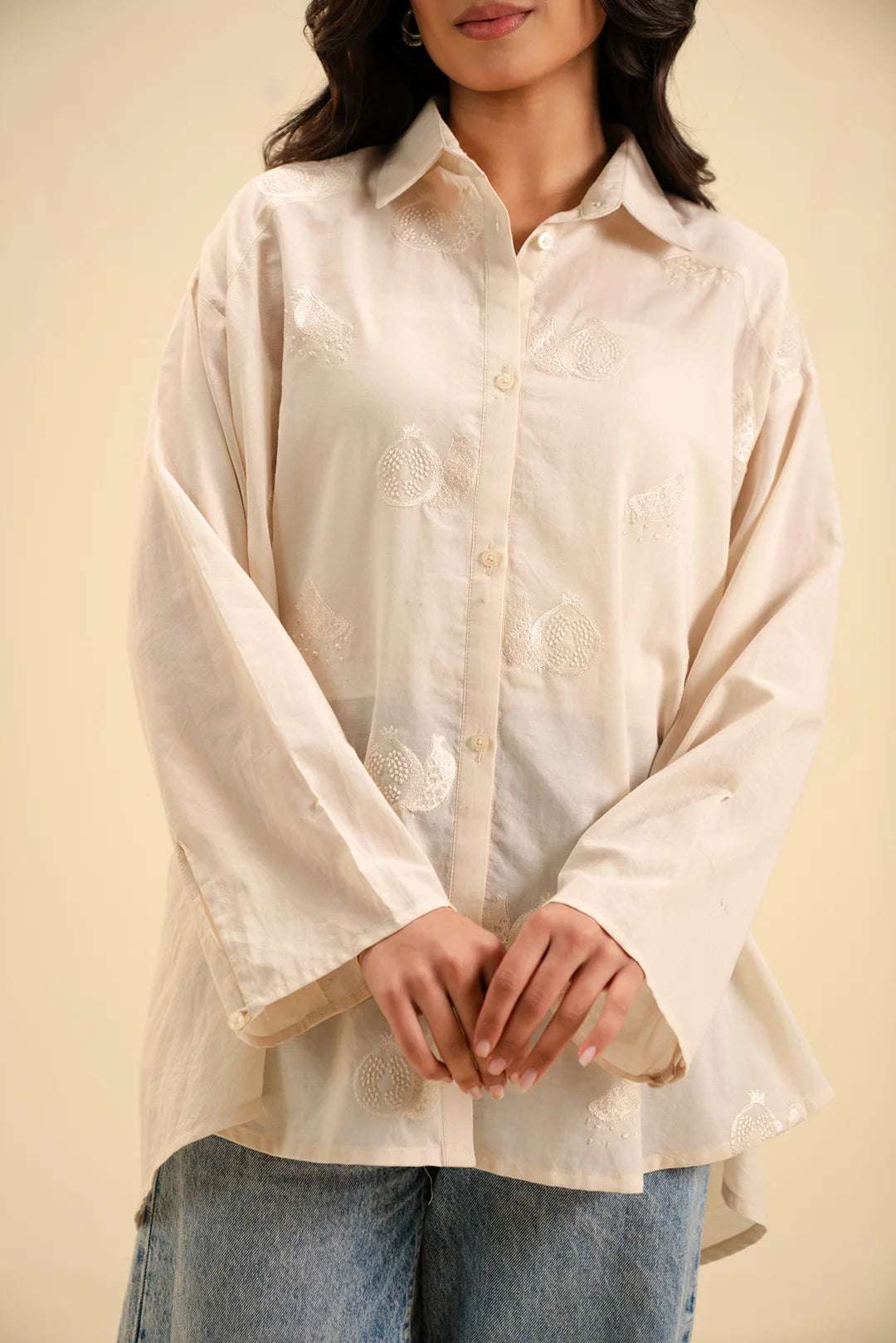Elegant embroidered cambric shirt – versatile button-down top for all seasons.