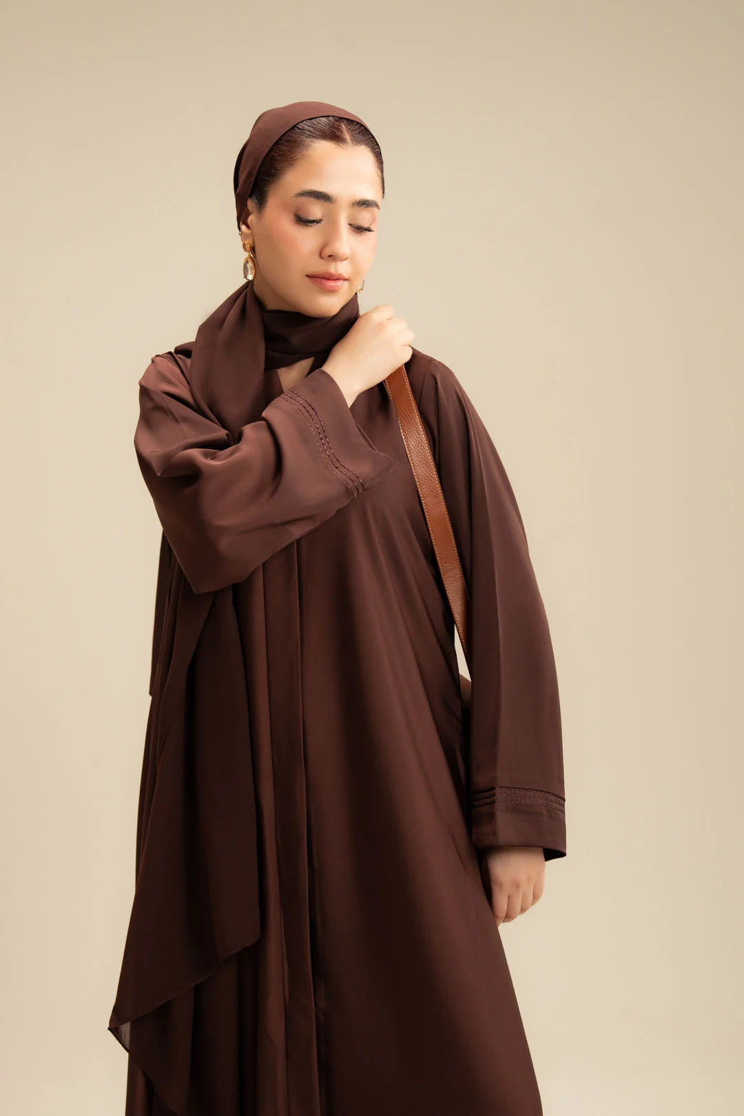 Elegant embroidery detail on sleeve of brown abaya – women's modest fashion Beyond East