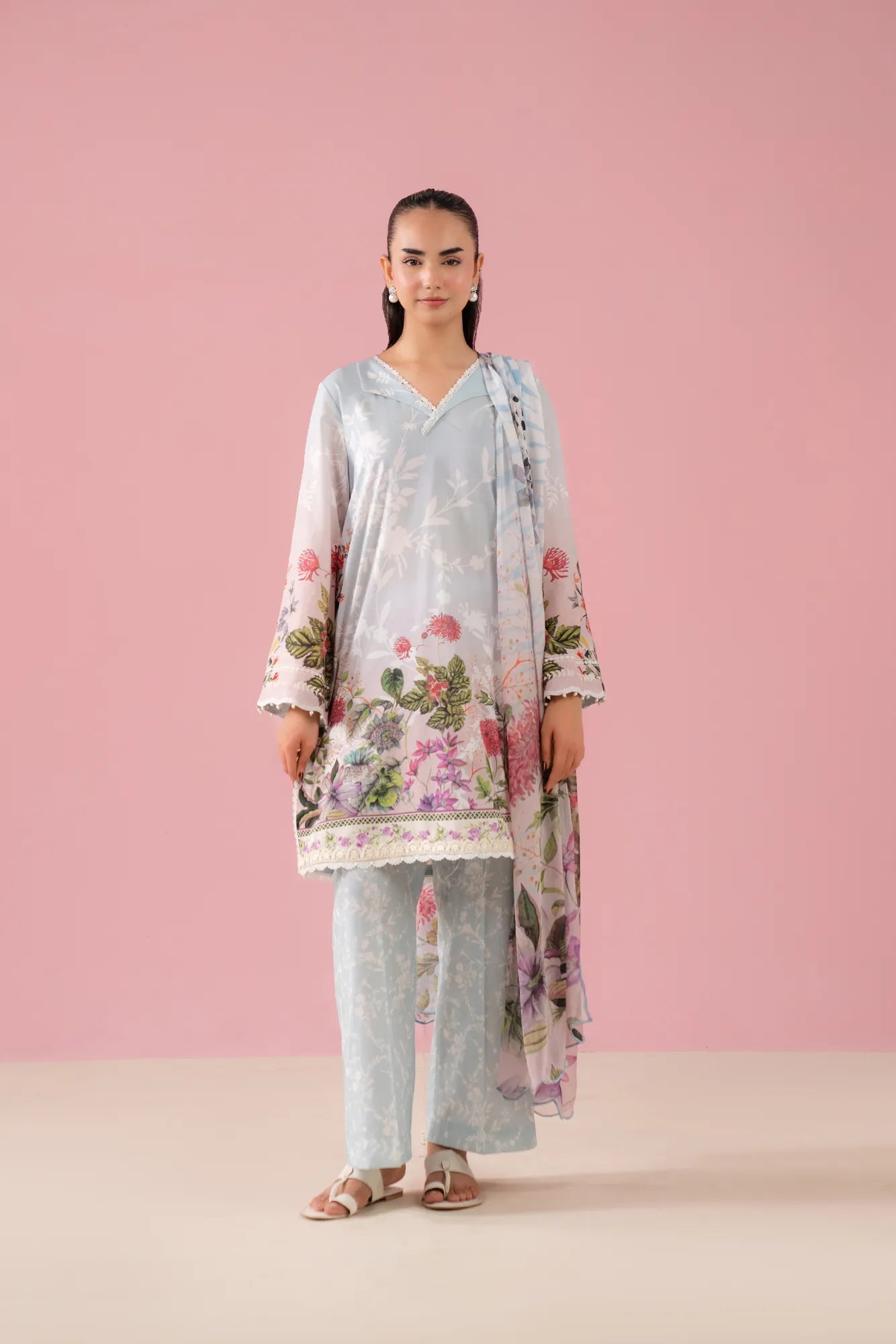 Elegant sky pink 3-piece embroidered lawn suit with digital printed shirt, cambric trousers, and chiffon dupatta, featuring a dyed organza border ideal for women in Sargodha's Canal Palms Phase 4 Pakistan