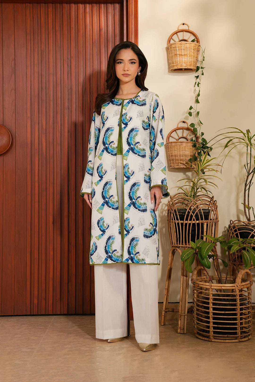 Elegant white and blue printed kurta for women - stylish Pakistani casual wear for summer.