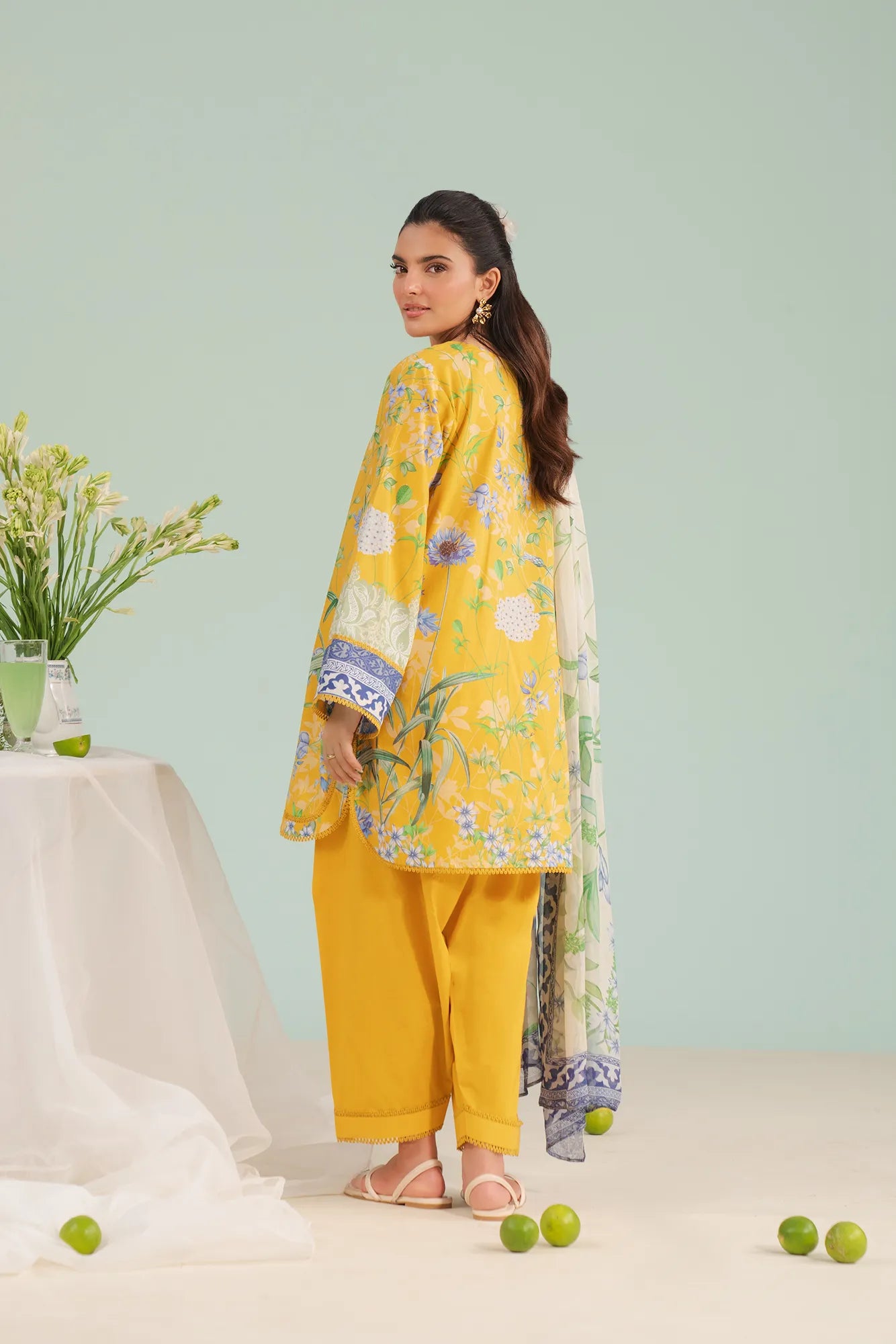 Elegant women’s unstitched lawn suit with cambric trouser and chiffon dupatta, now trending in Divine Gardens and Model Town Sialkot