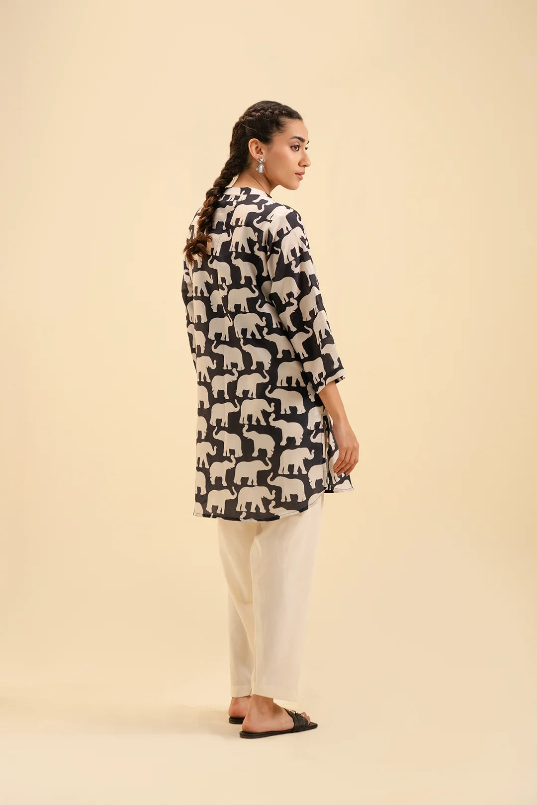 Elephant pattern printed shirt for women – modern and bold outfit.