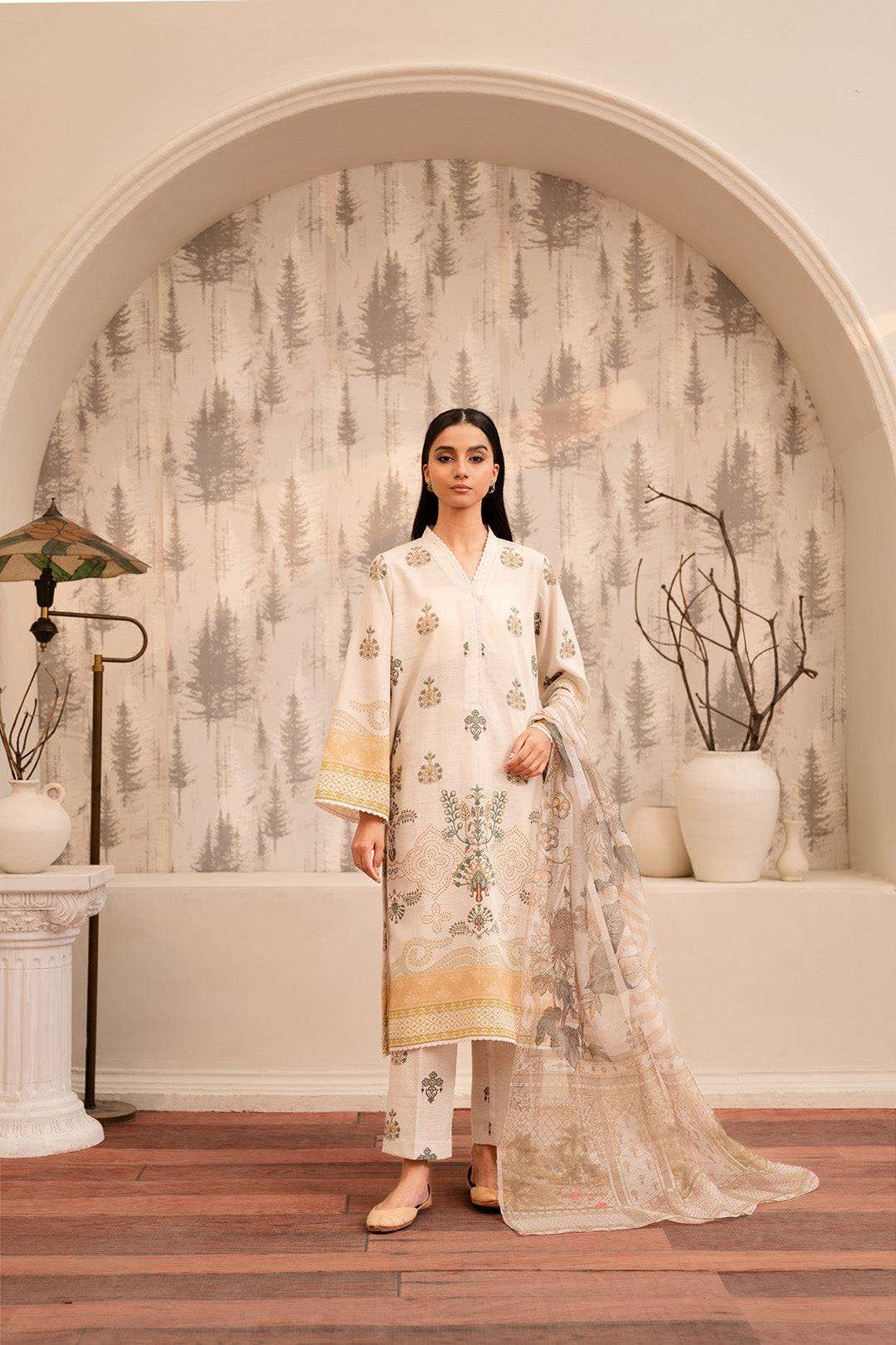 Embroidered shirt with a floral print and lace detailing on the neckline and sleeves