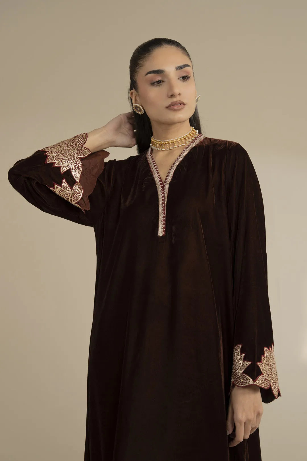 Front close-up of embroidered velvet kaftan showing neckline and relaxed fit silhouette