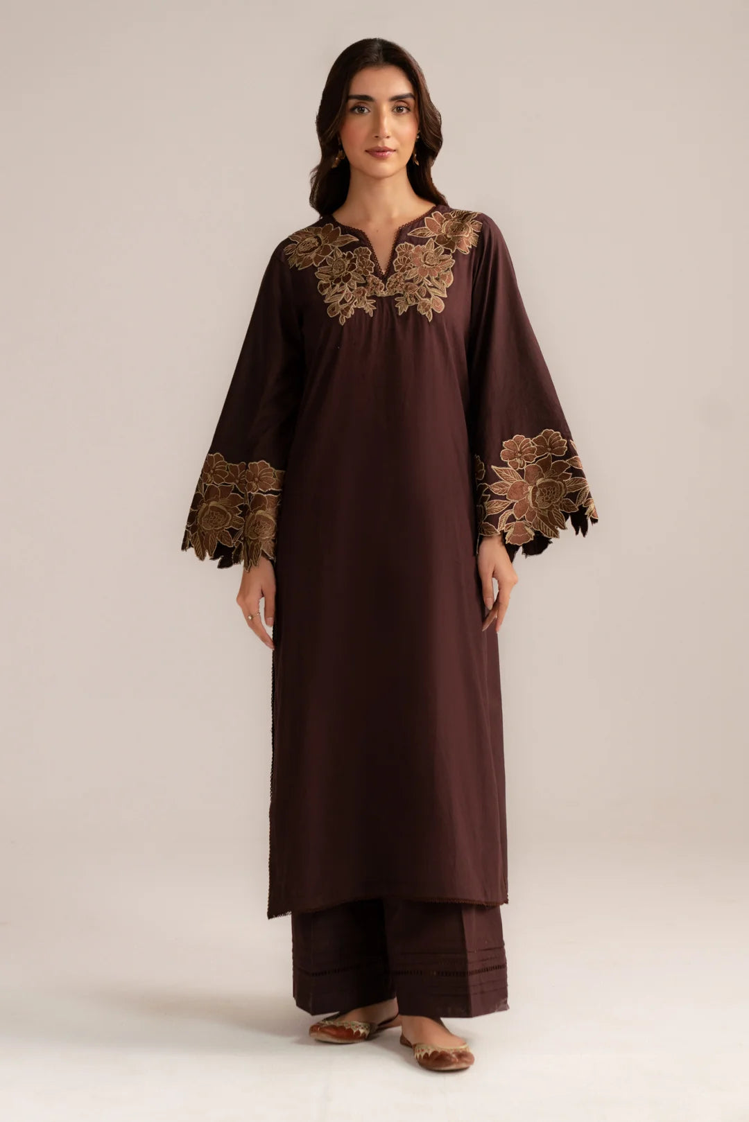 Front full-length view of dark brown embroidered cambric 2 piece suit for women
