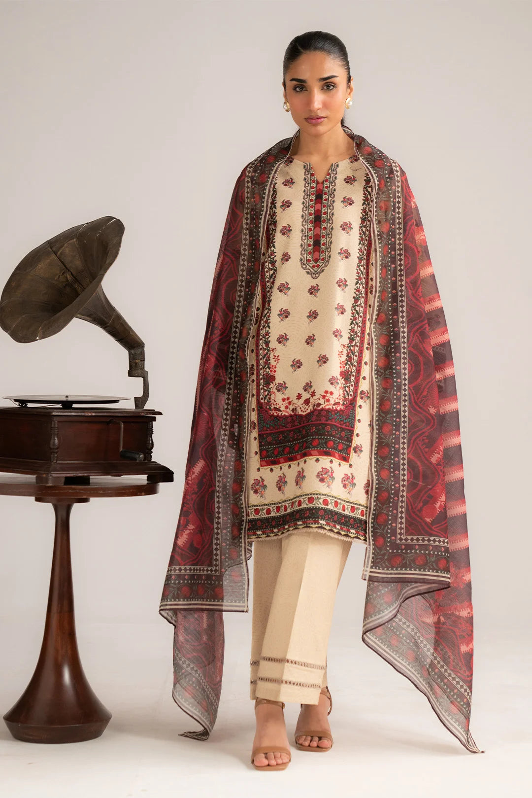 Front full-length view of ivory printed 3 piece lawn suit with dupatta