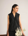 Front pose of black cropped vest and wide-leg trouser set for women

