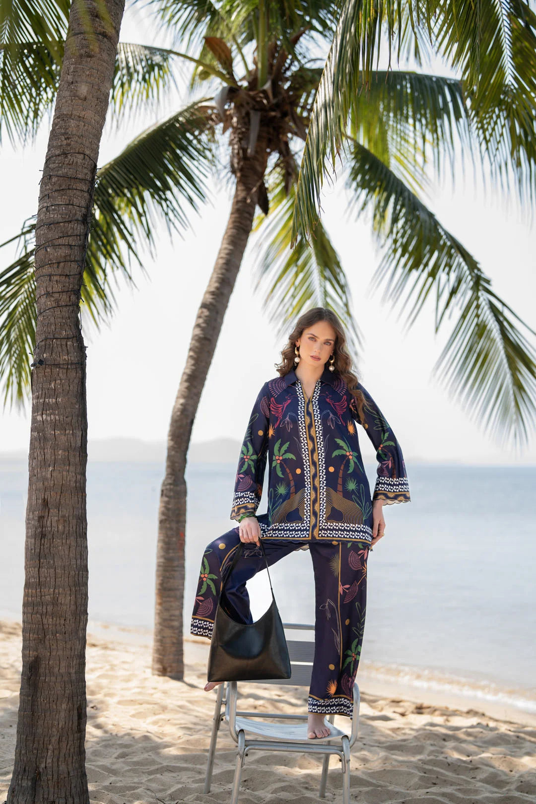 Front standing pose of blue printed satin-feel co-ord set styled for resort wear