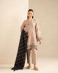 Front view of beige khaddar suit with black embroidery and printed shawl