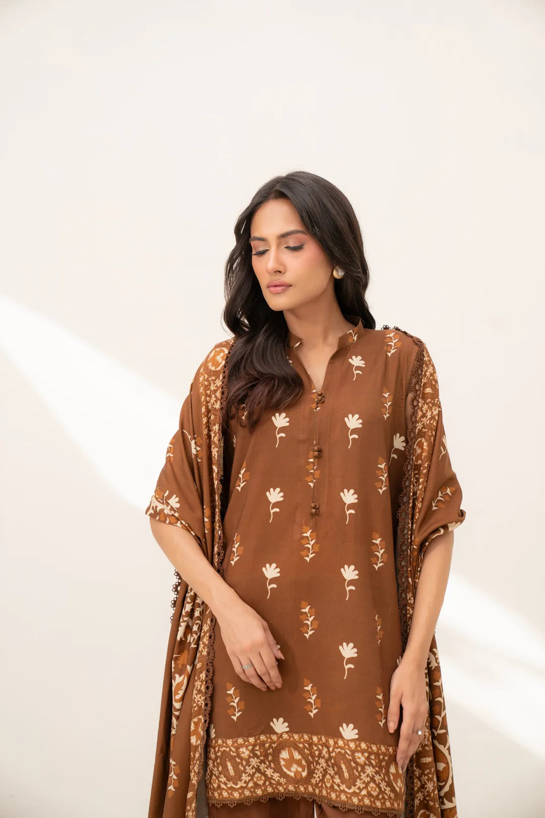 Front view of brown motif printed linen shirt with dyed trousers (3 piece unstitched)