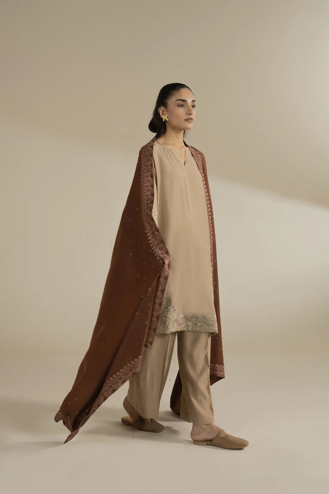 Full-body styling shot with the shawl wrapped around shoulders, showing fall and winter layering look.