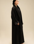 Full-length black stone abaya back view – women's Islamic modest wear Beyond East