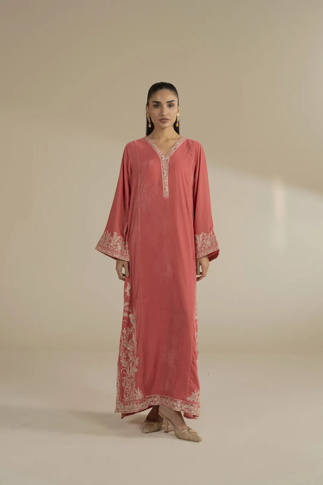 Full-length peach velvet embroidered kaftan worn front view, stitched winter dress