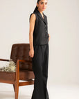 Full-length standing pose of black ready-to-wear cropped vest outfit for women
