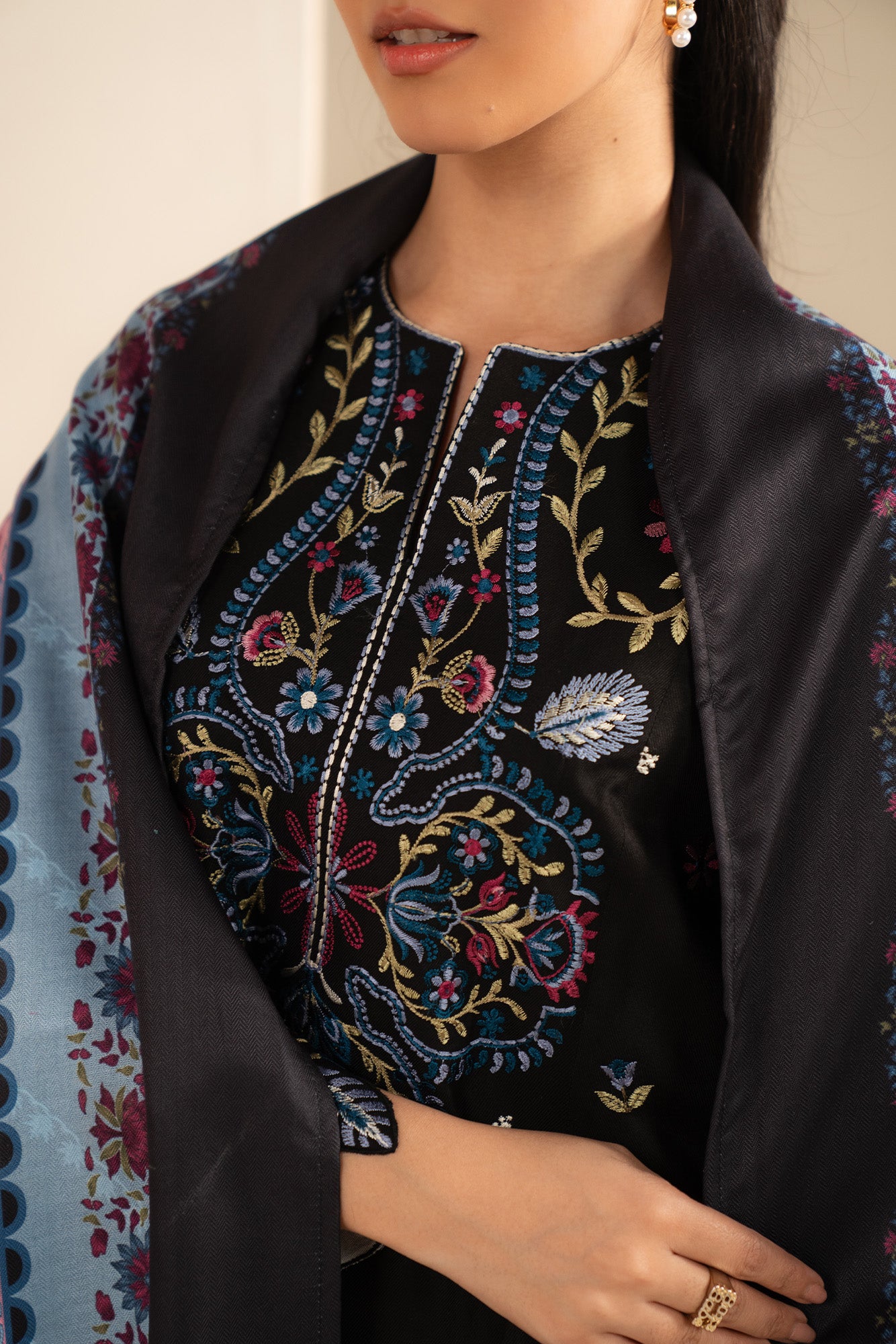Full-length view of embroidered Marina suit with matching trousers and printed shawl, showing overall silhouette.