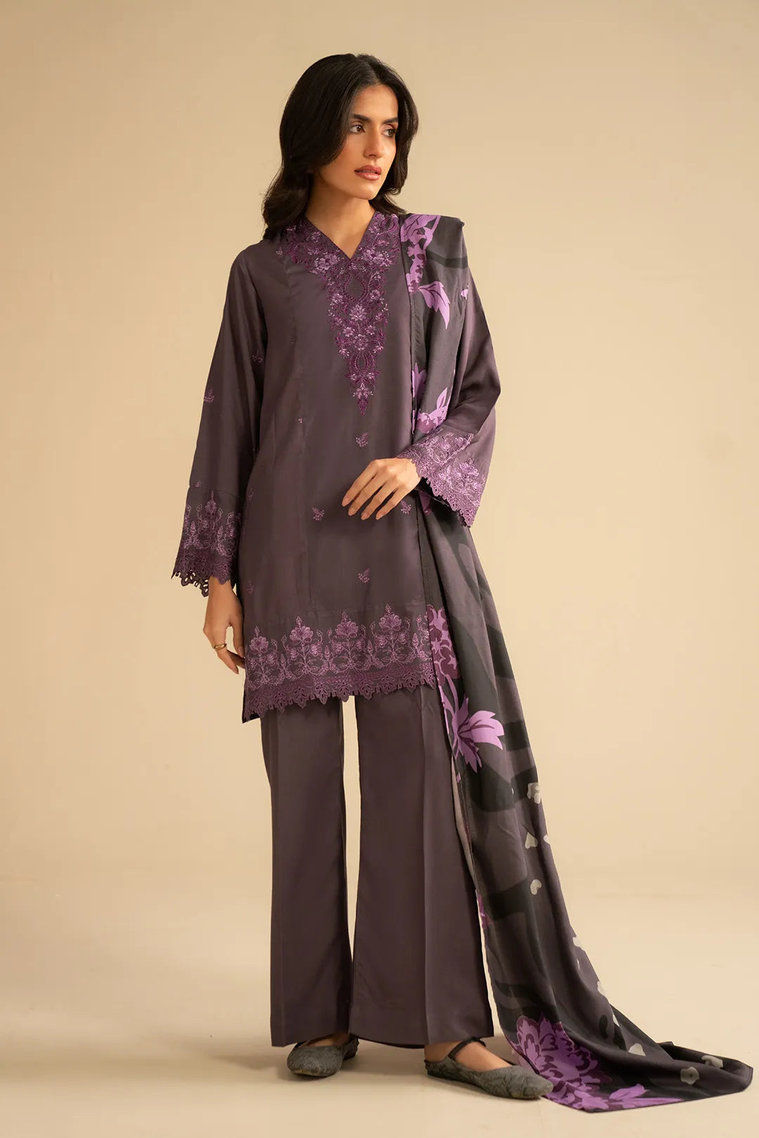 Full-length view of purple embroidered linen suit with matching trousers and printed shawl, styled for an elegant look