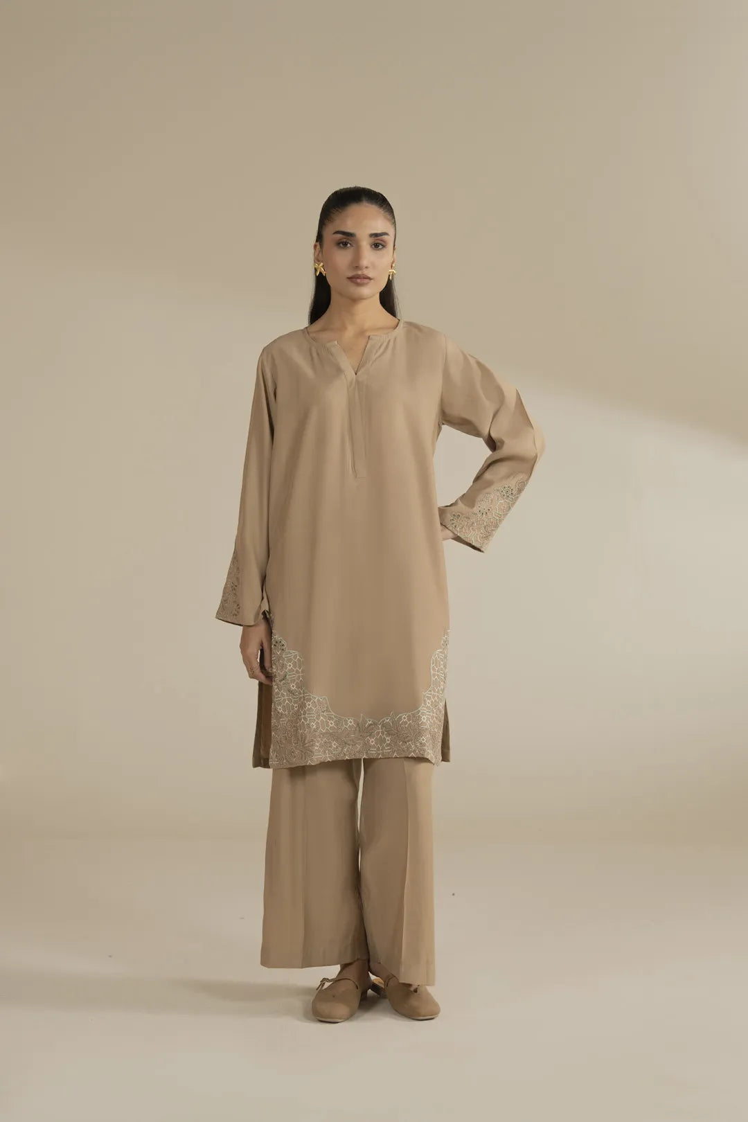 Full front view of beige embroidered 2 piece blended suit with matching straight trousers.