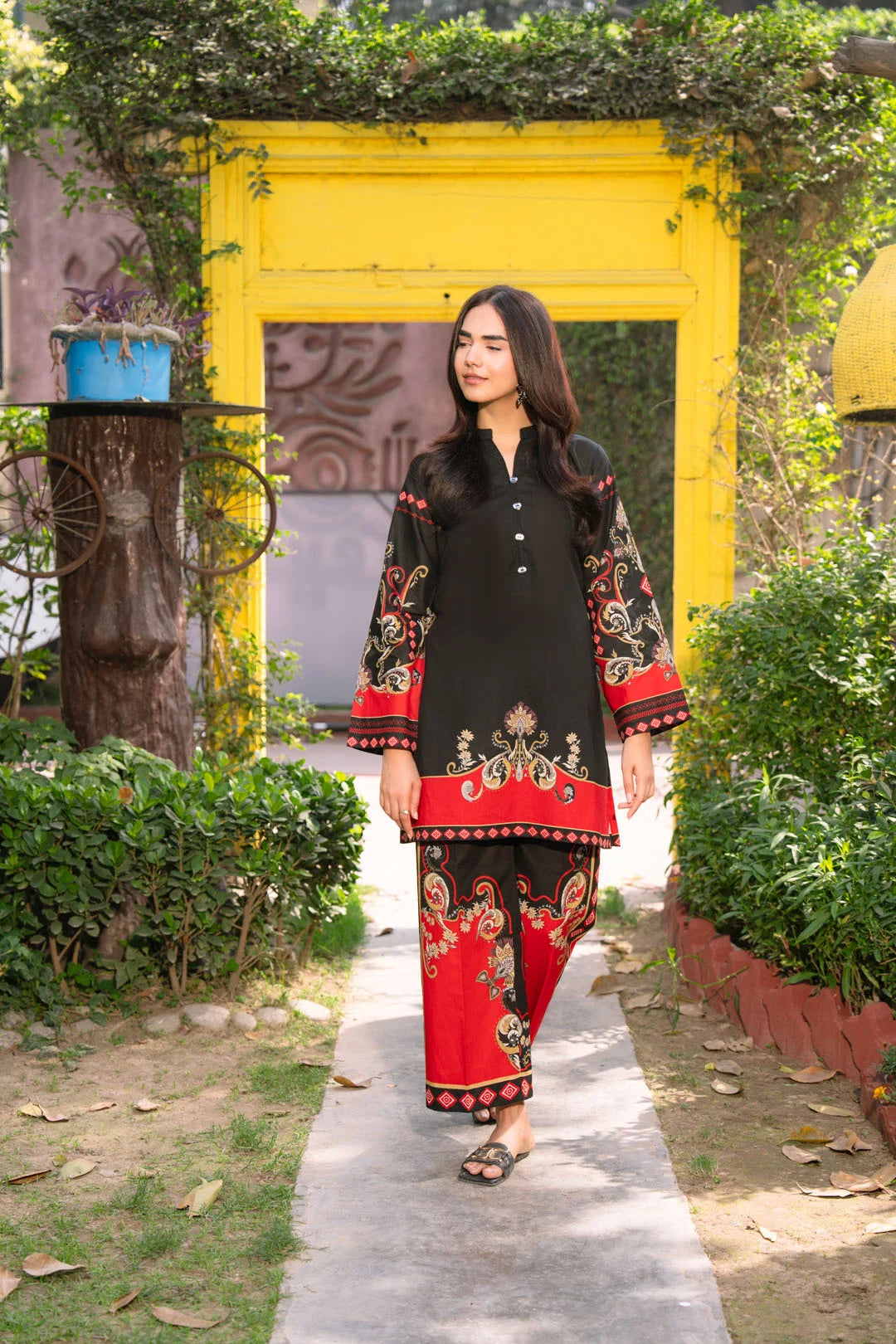Full length view of black red ready to wear 2 piece suit for women