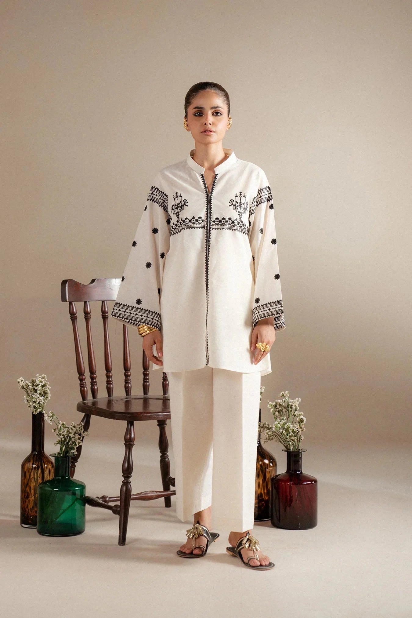 Get white 2 piece embroidered lawn suit delivered - monochrome Pakistani outfit geometric patterns