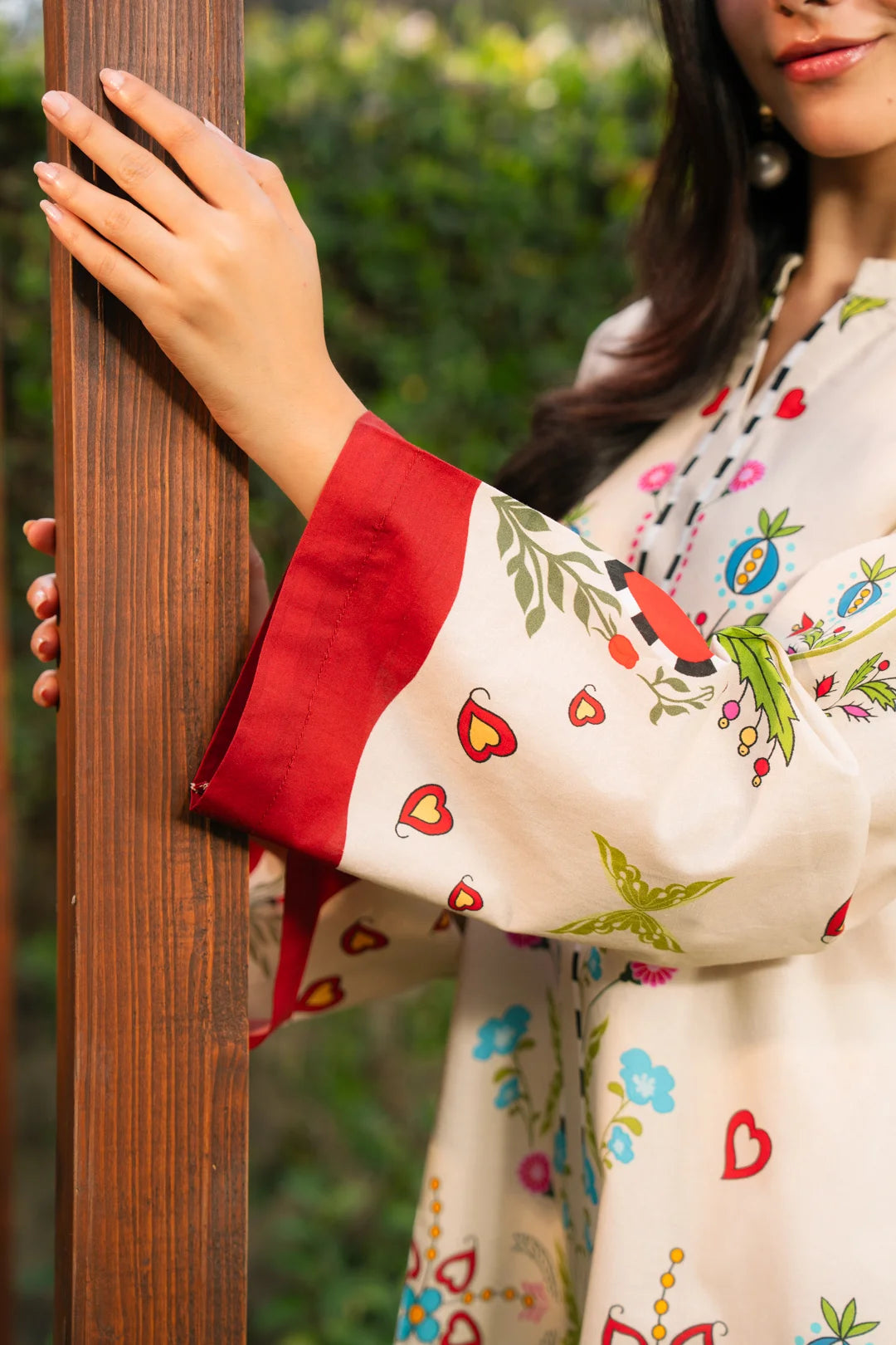 Ivory cambric kameez back view red botanical print women Pakistani pret summer collection