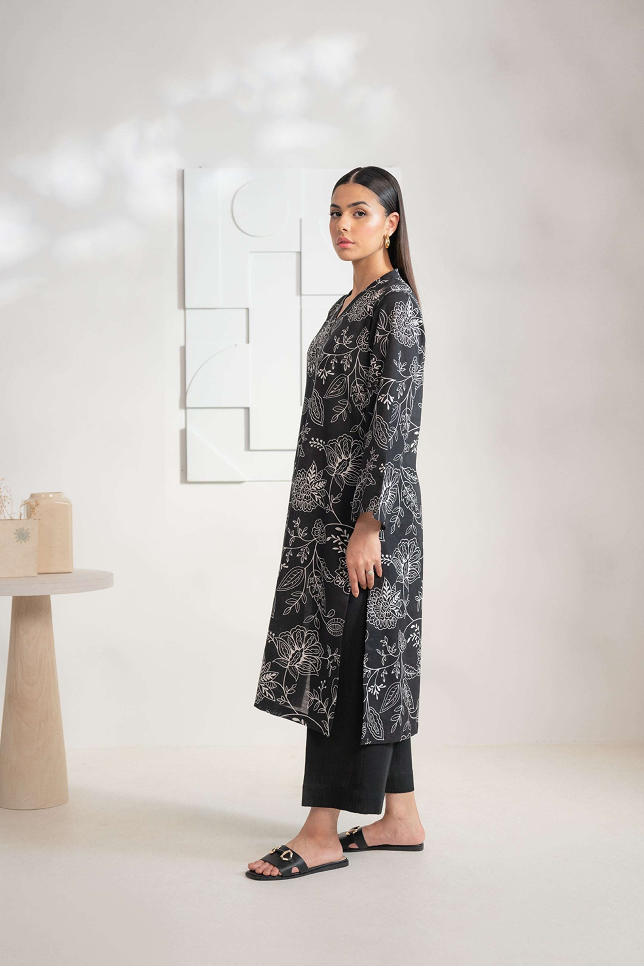 Ladies’ black and white Karandi shirt with contemporary design, shop this stunning piece online
