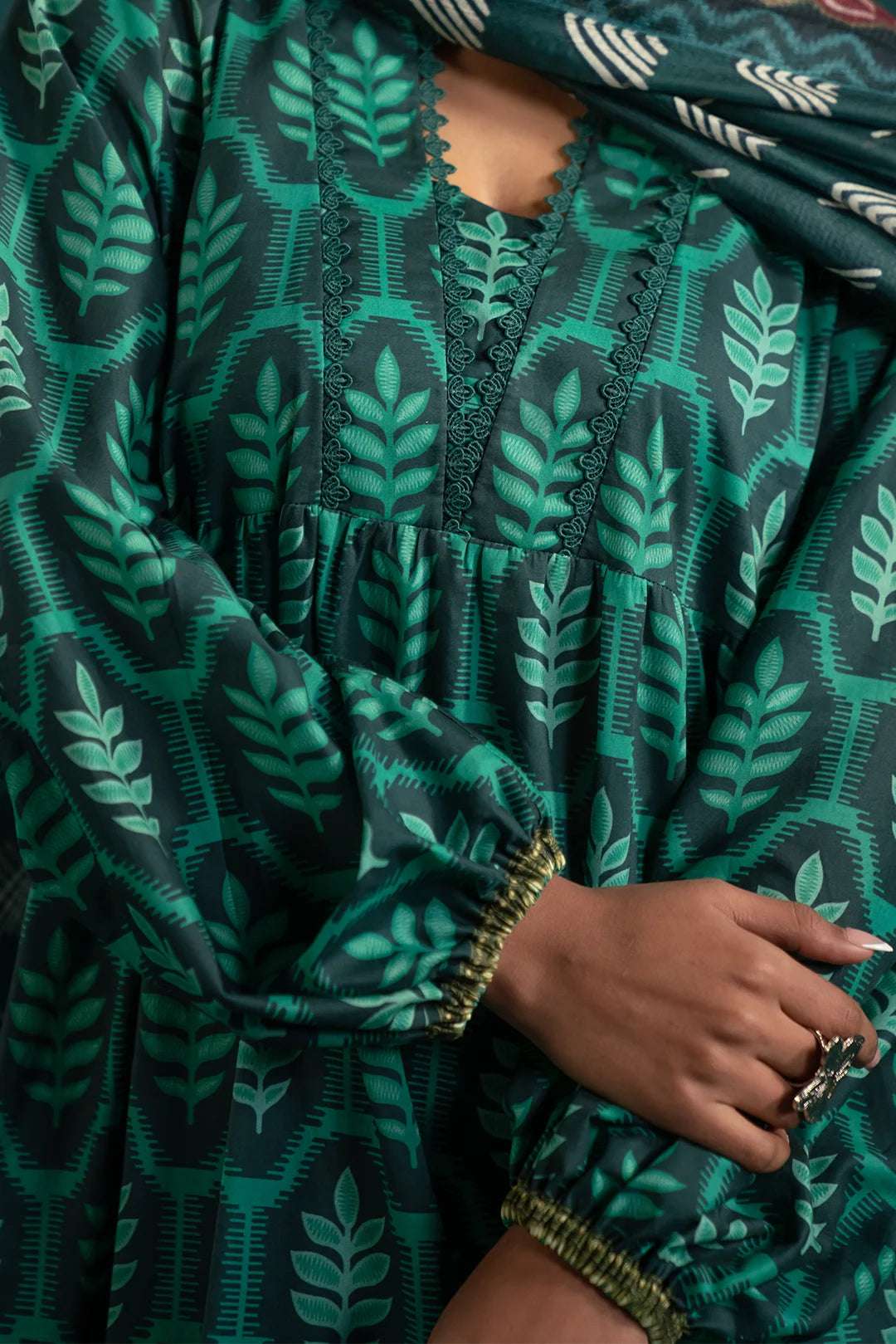 Latest Lawn Suit Design with Abstract Monark Dupatta – Elevate your summer wardrobe with this fashionable three-piece lawn suit, crafted with premium fabric and intricate digital prints.