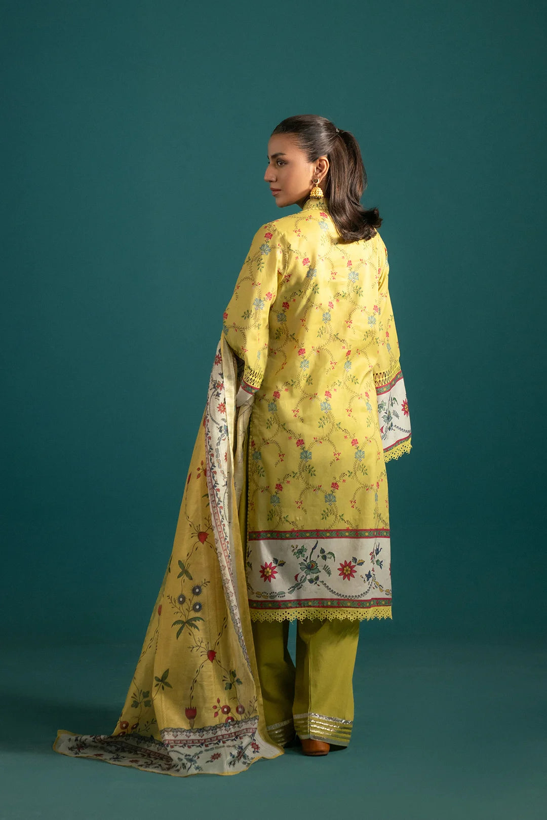 Latest Lawn Suits for Women - Festive & Casual Wear: A must-have Pakistani lawn suit with a fusion of classic and modern prints, enhanced with an elegant French border for a sophisticated appeal.