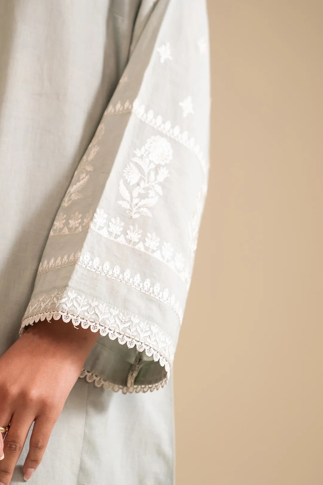 Latest embroidered cambric suits online – chic and sophisticated fashion choice.